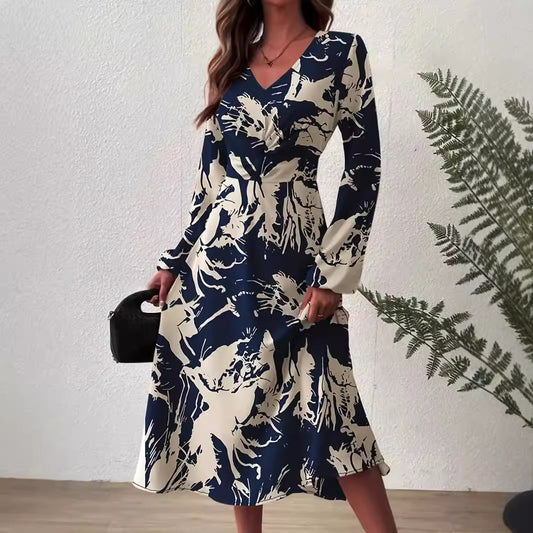 Robe midi pour femmes avec des détails floraux et un élégant décolleté en V Chic und Stil