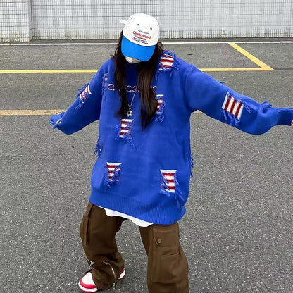 Urban knit pullover for women with unique ribbed details and a chic worn design