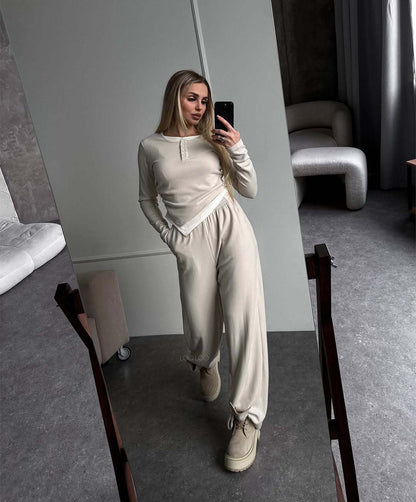 Fashionable lounge set for women with a versatile top and chic elastic pants.