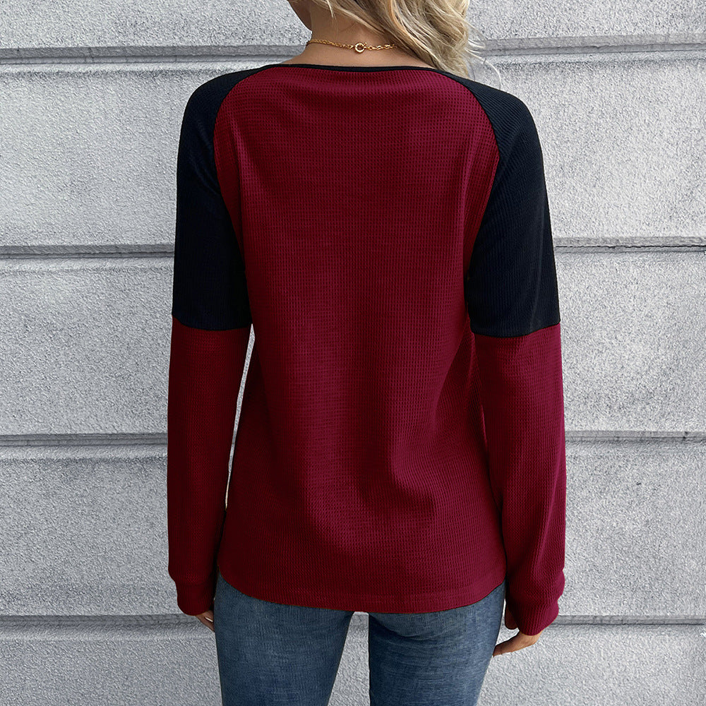 Chemise Henley décontractée pour femmes en tissu gaufré avec design de manches contrastées Chic und Stil