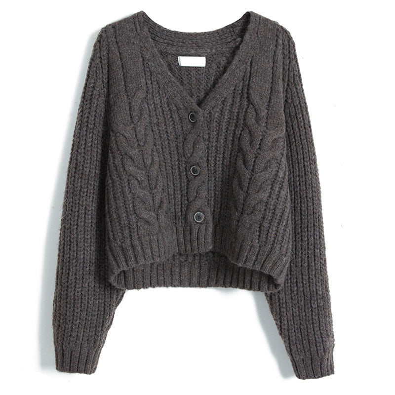 Ladies cozy knit pullover with decorative cable pattern Chic and Style