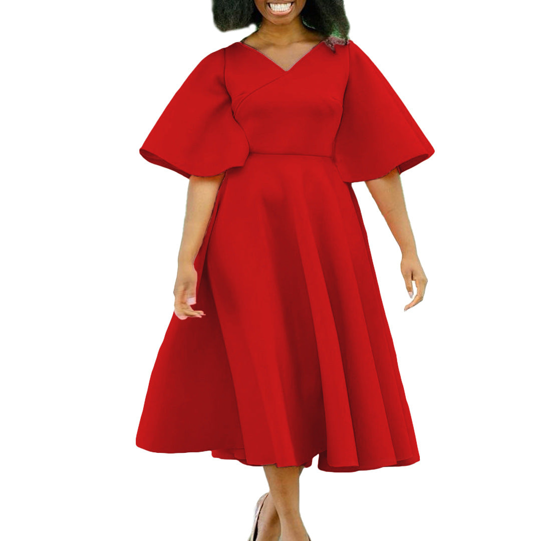 Robe portefeuille pour femmes avec une coupe fluide et des manches volumineuses Chic und Stil