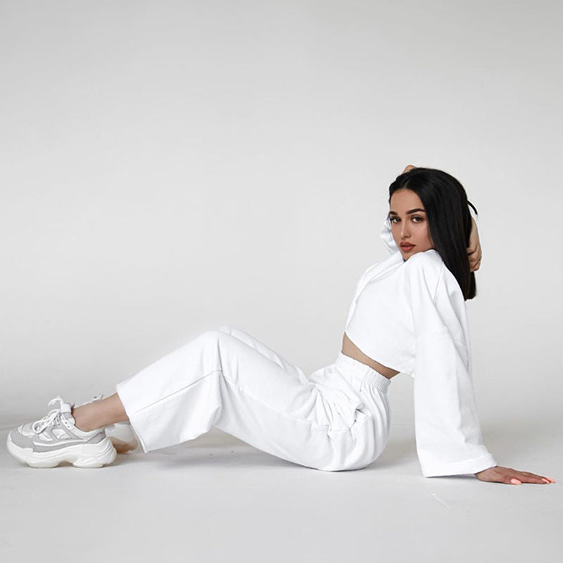 Elegant two-piece lounge set for women with a loose top and high-waisted pants Chic and Style