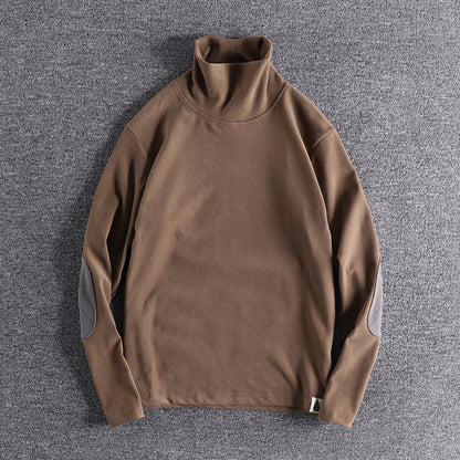 Pull en polaire à col montant pour hommes avec des coudières contrastantes Chic und Stil