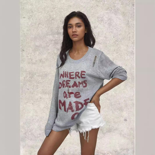 Pull oversized pour femmes avec des inscriptions créatives et des détails raffinés Chic und Stil