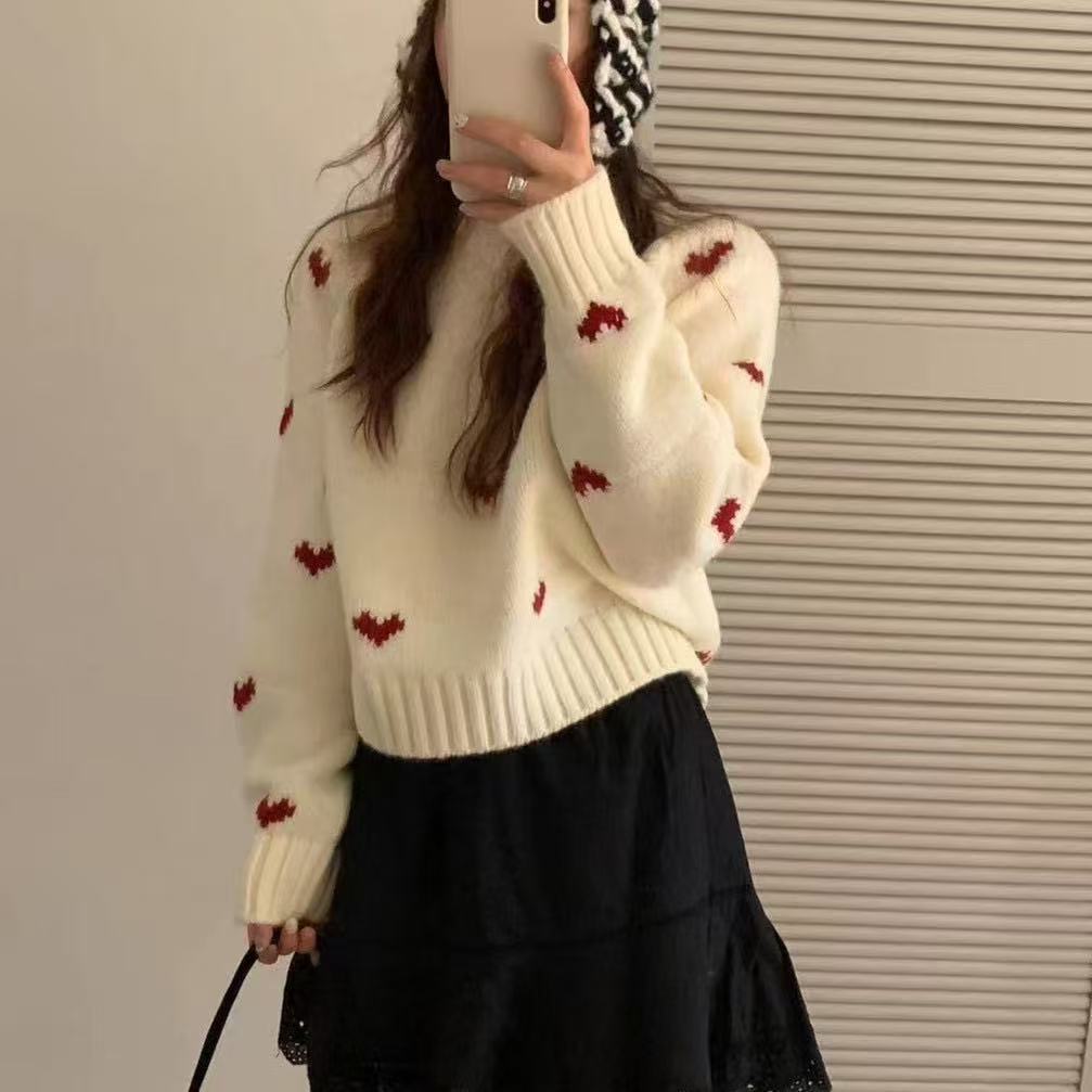 Femmes pull tricoté avec motif cœur et large bande Chic und Stil