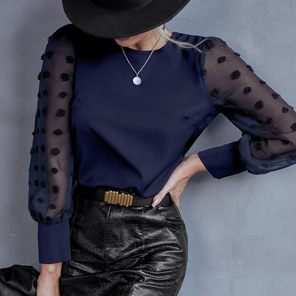 Chemisier femme avec des manches transparentes bouffantes et un détail décoratif Chic und Stil