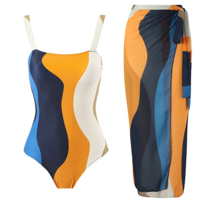 Maillot de bain une pièce pour femmes avec jupe portefeuille à la mode et motif à vagues graphiques Chic und Stil