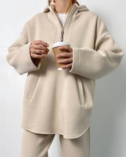 Dame oversized Fleece-Hoodie avec fermeture éclair latérale et pantalons larges Chic und Stil