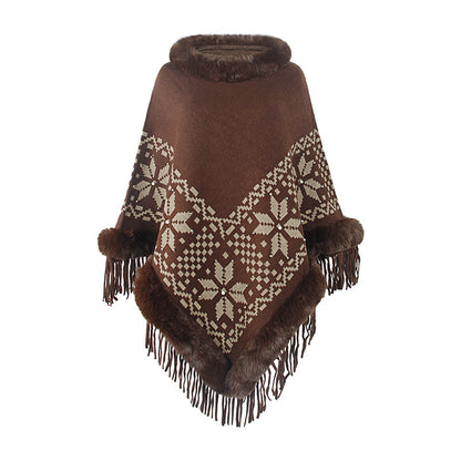 Elegant women's poncho with decorative fringe design and faux fur trim Chic and Style