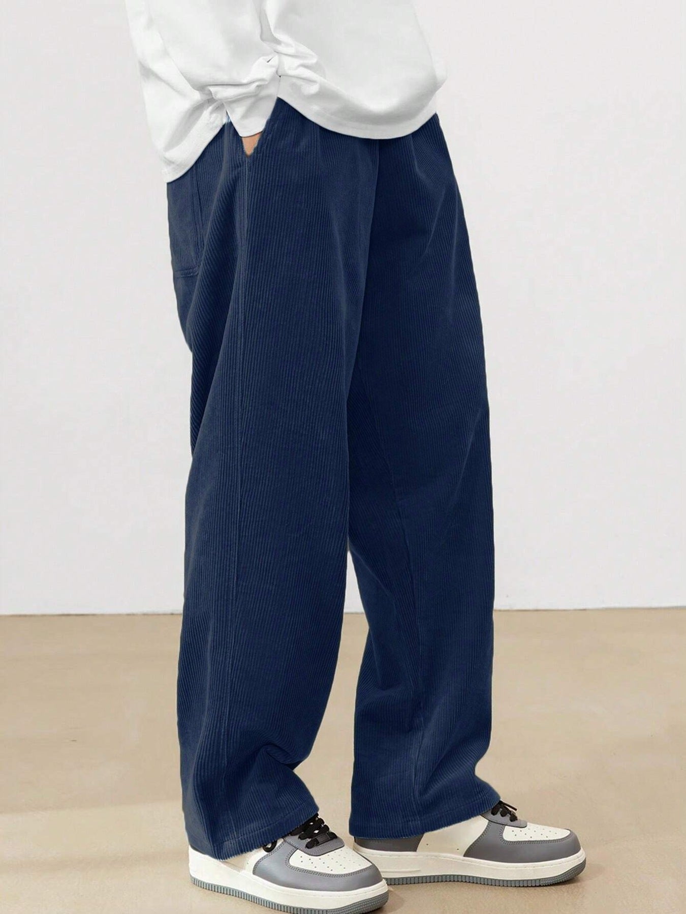 Wide corduroy pants for men with elastic waistband and practical side pockets Chic and Style