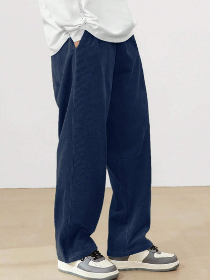 Wide corduroy pants for men with elastic waistband and practical side pockets Chic and Style