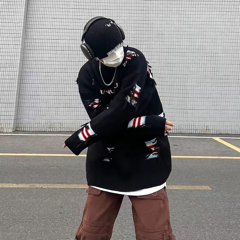 Urban knit pullover for women with unique ribbed details and a chic worn design