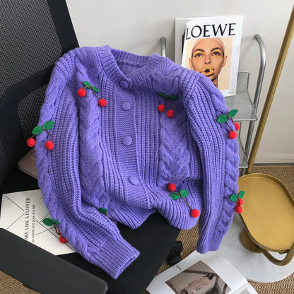 Pull en grosse maille pour femmes avec des appliqués floraux et des détails de boutons Chic und Stil