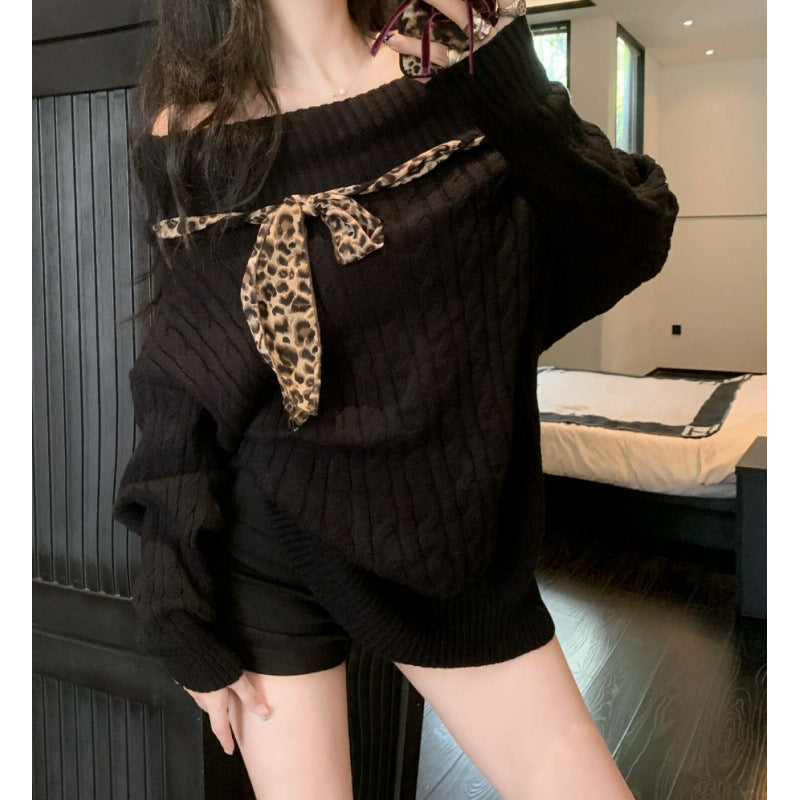 Pull en grosses mailles pour femmes avec épaule dénudée et accent de nœud ludique Chic und Stil