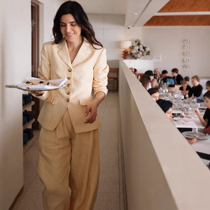 Elegant suit set for women with fitted jacket and wide-leg pants Chic and Style