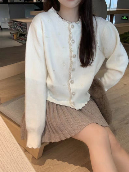 Dames Élégante cardigan en tricot avec boutons perlés et design structuré Chic und Stil