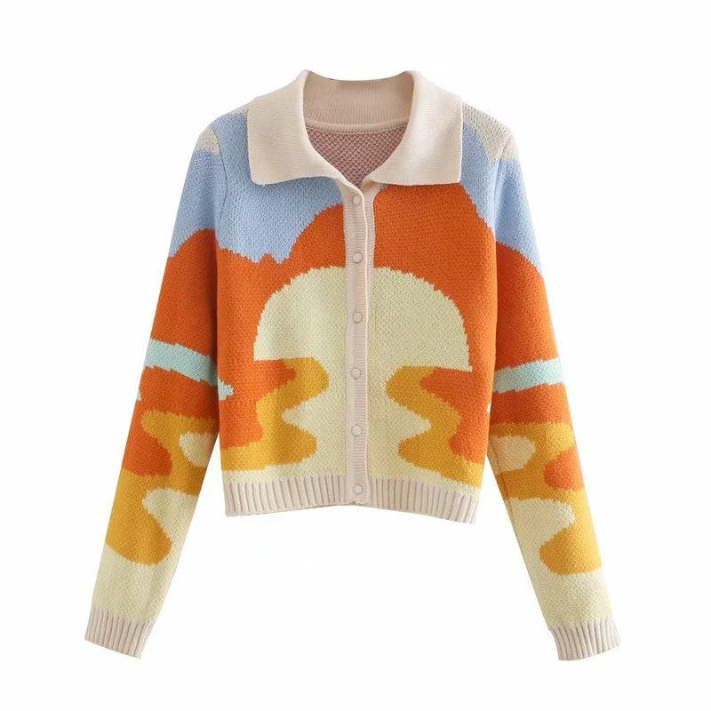 Cardigan en tricot à la mode pour femmes avec un mélange de motifs contrastés Chic und Stil