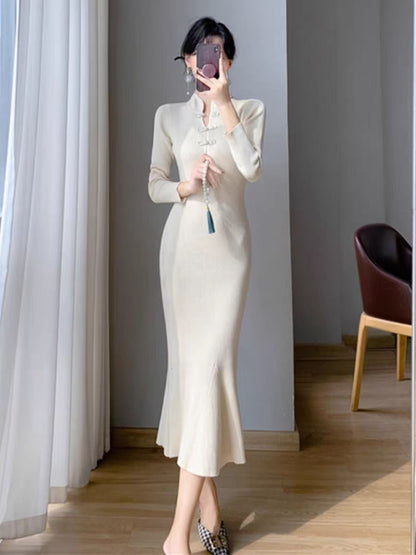 Robe en tricot élégante pour femmes avec col haut et ourlet asymétrique Chic und Stil