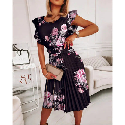 Robe midi femme avec plis et accent floral ainsi que ceinture cintrée Chic und Stil
