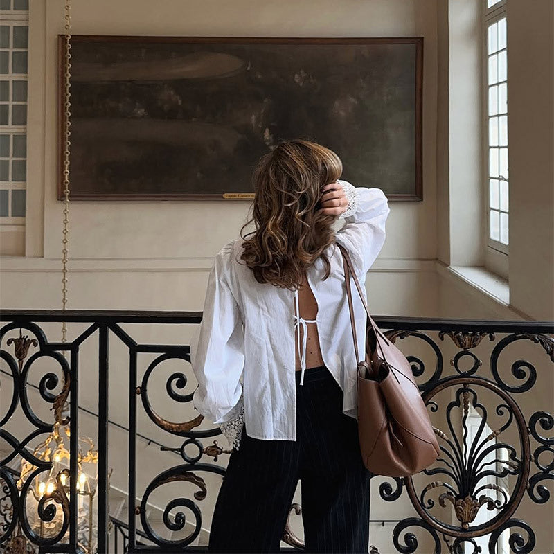 Chemisier pour femmes avec des accents de dentelle élégants et des manches bouffantes Chic und Stil