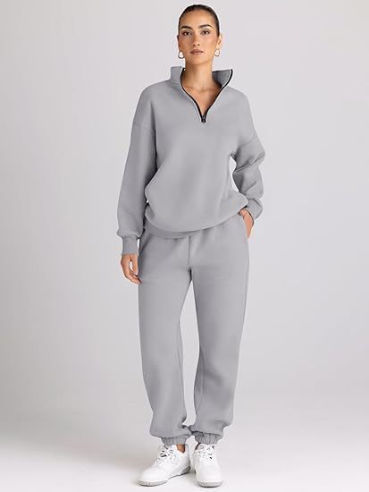 Ladies sporty sweater with high collar and chic jogger pants set