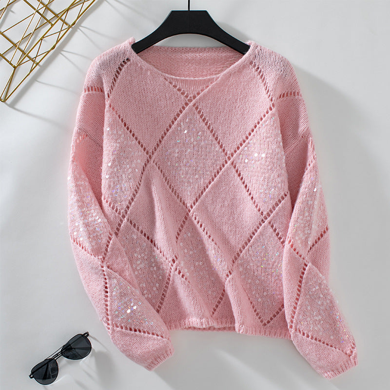 Pull femme à la mode avec un design tricoté élaboré et des éléments scintillants Chic und Stil