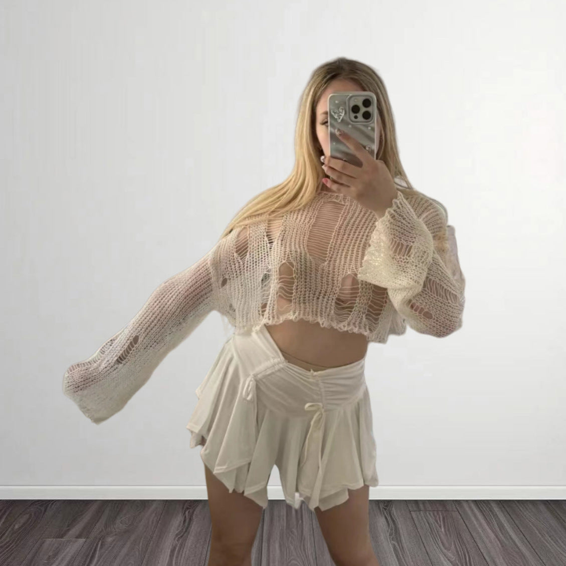 Dames Haut de crop tendance avec structure tricot aérienne et mailles ouvertes Chic und Stil