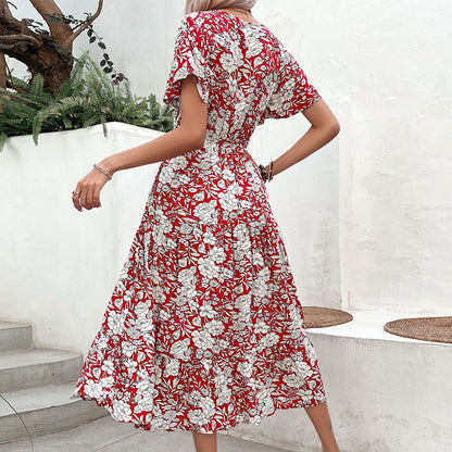 Robe midi à imprimé floral pour femmes avec décolleté en V et manches courtes flottantes Chic und Stil