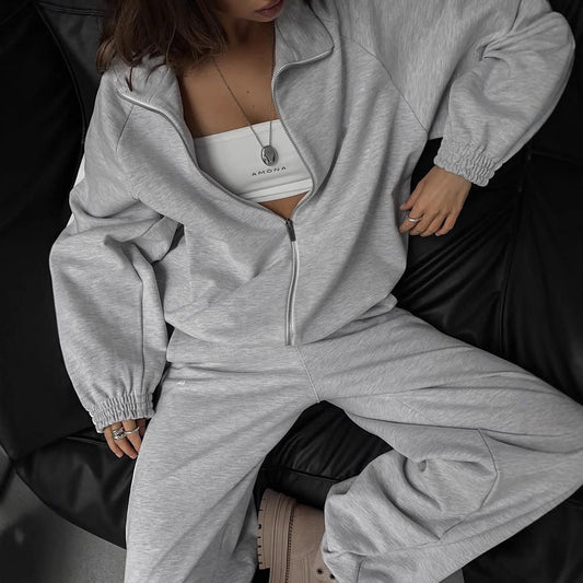 Women's sporty outfit with trendy zipper and wide pants Chic and Style