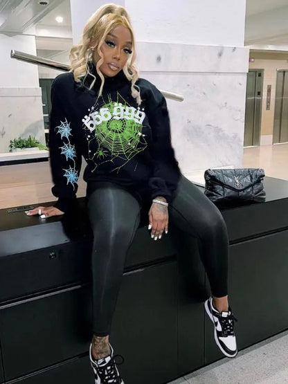 Dames hoodie avec design créatif en toile d'araignée Chic und Stil