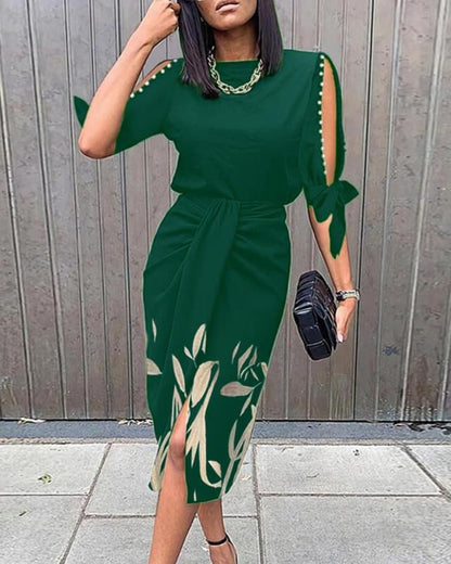 Robe portefeuille pour dames avec des manches décoratives et un ourlet floral Chic und Stil