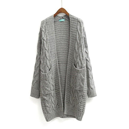 Dames cardigan avec motif de tresse épaisse et poches Chic und Stil