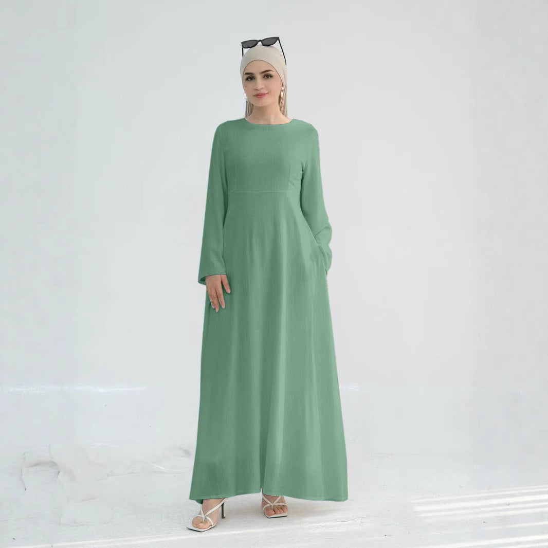 Robe maxi élégante pour dames avec des manches longues et des poches latérales Chic und Stil