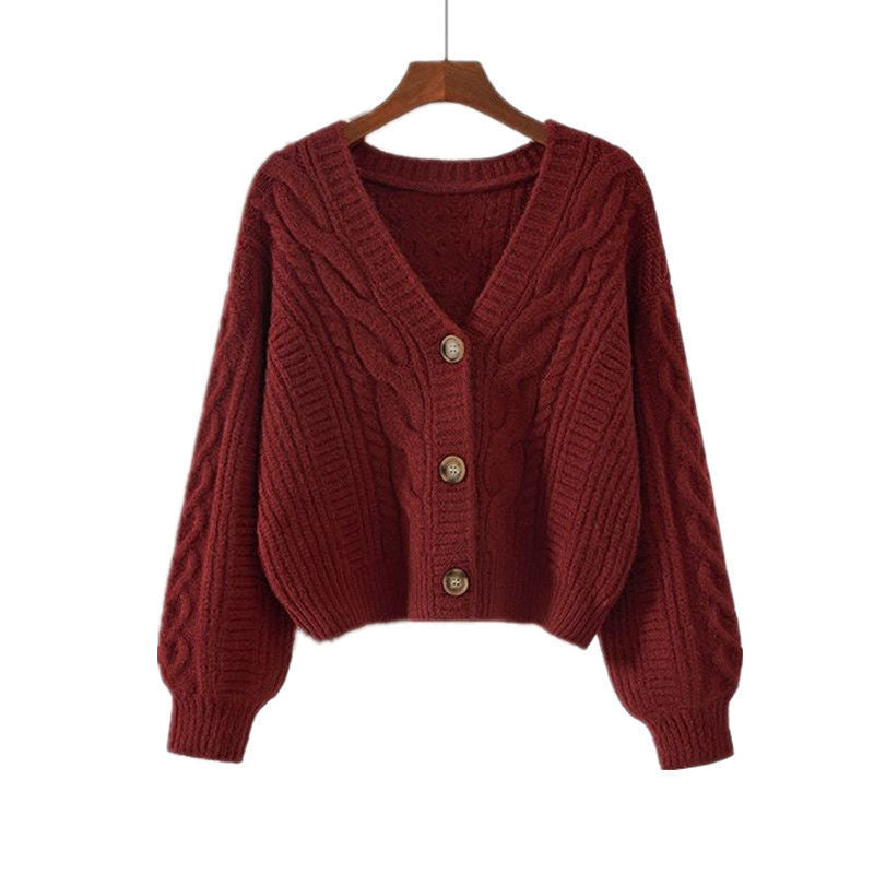 Dames pull-over en tricot douillet avec motif en torsade et fermeture à bouton Chic und Stil