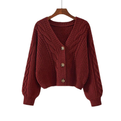 Dames pull-over en tricot douillet avec motif en torsade et fermeture à bouton Chic und Stil