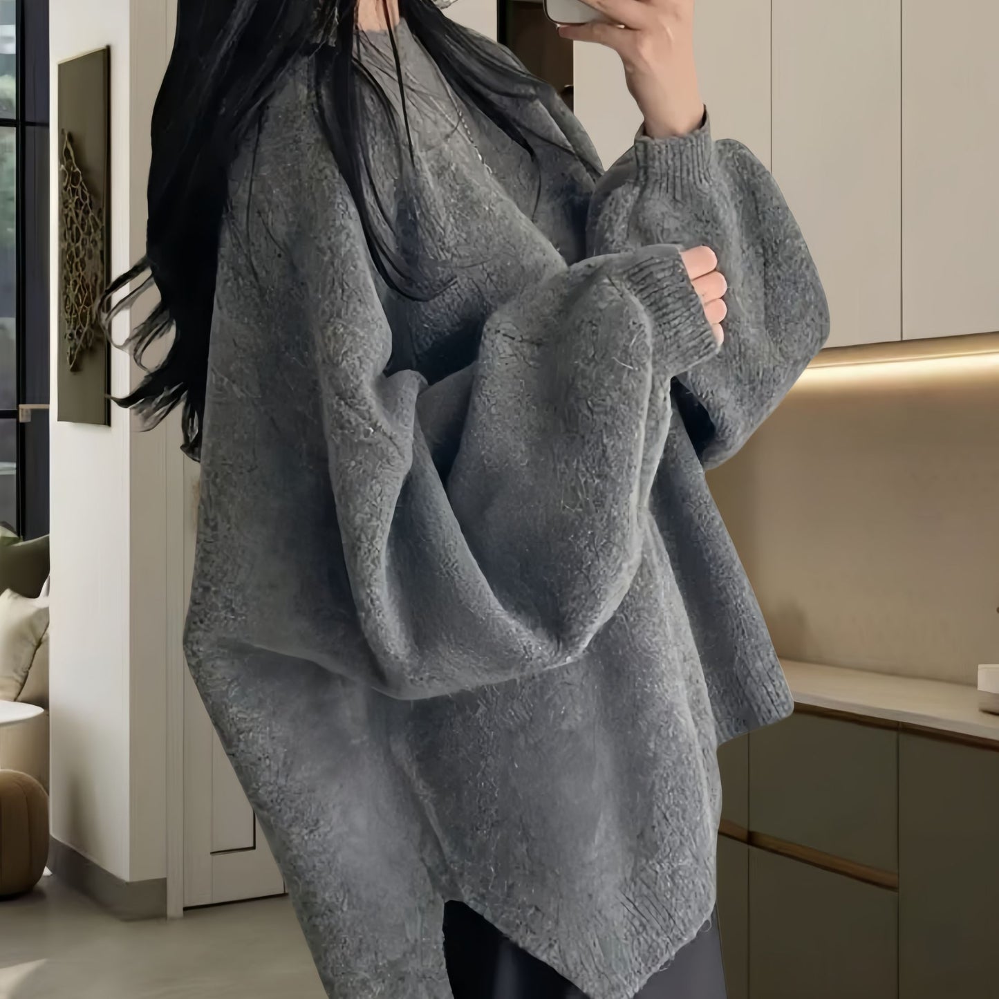 Dames pull en tricot surdimensionné en matériau polaire doux et avec des éléments de coupe modernes Chic und Stil