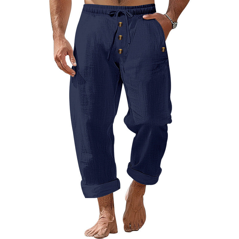 Casual beach pants for men with elastic waistband and practical button details Chic and Style