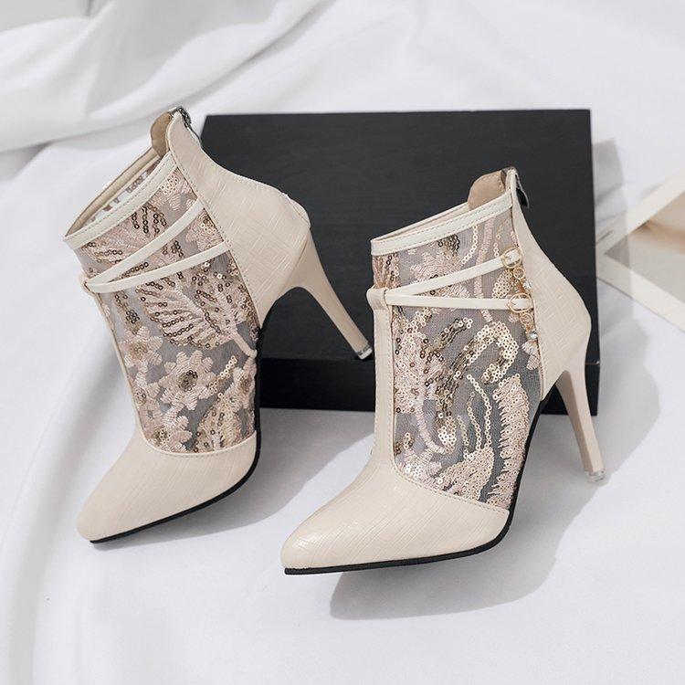 Bottes de cheville élégantes pour dames avec un matériau supérieur transparent et des applications scintillantes Chic und Stil