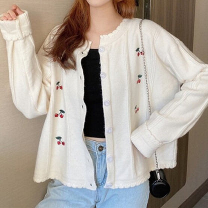 Cardigan pour femmes avec motif floral et fermeture à boutons Chic und Stil