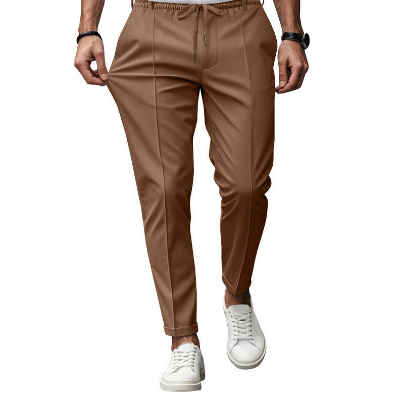 Men's fashionable sports pants with elastic waistband and practical welt pockets Chic and Style