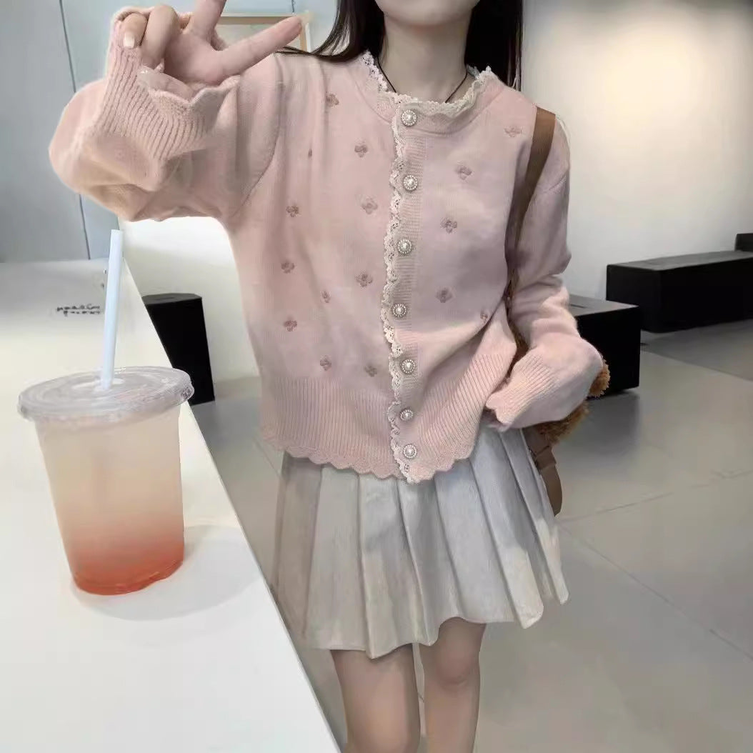 Dames Élégante cardigan en tricot avec boutons perlés et design structuré Chic und Stil