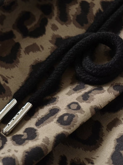 Trendy leopard wide-leg pants for women with elastic waistband and tie belt Chic and Style