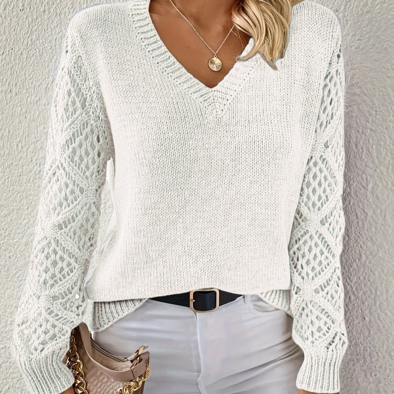 Pull en tricot pour femmes avec décolleté en V et manches crochetées Chic und Stil