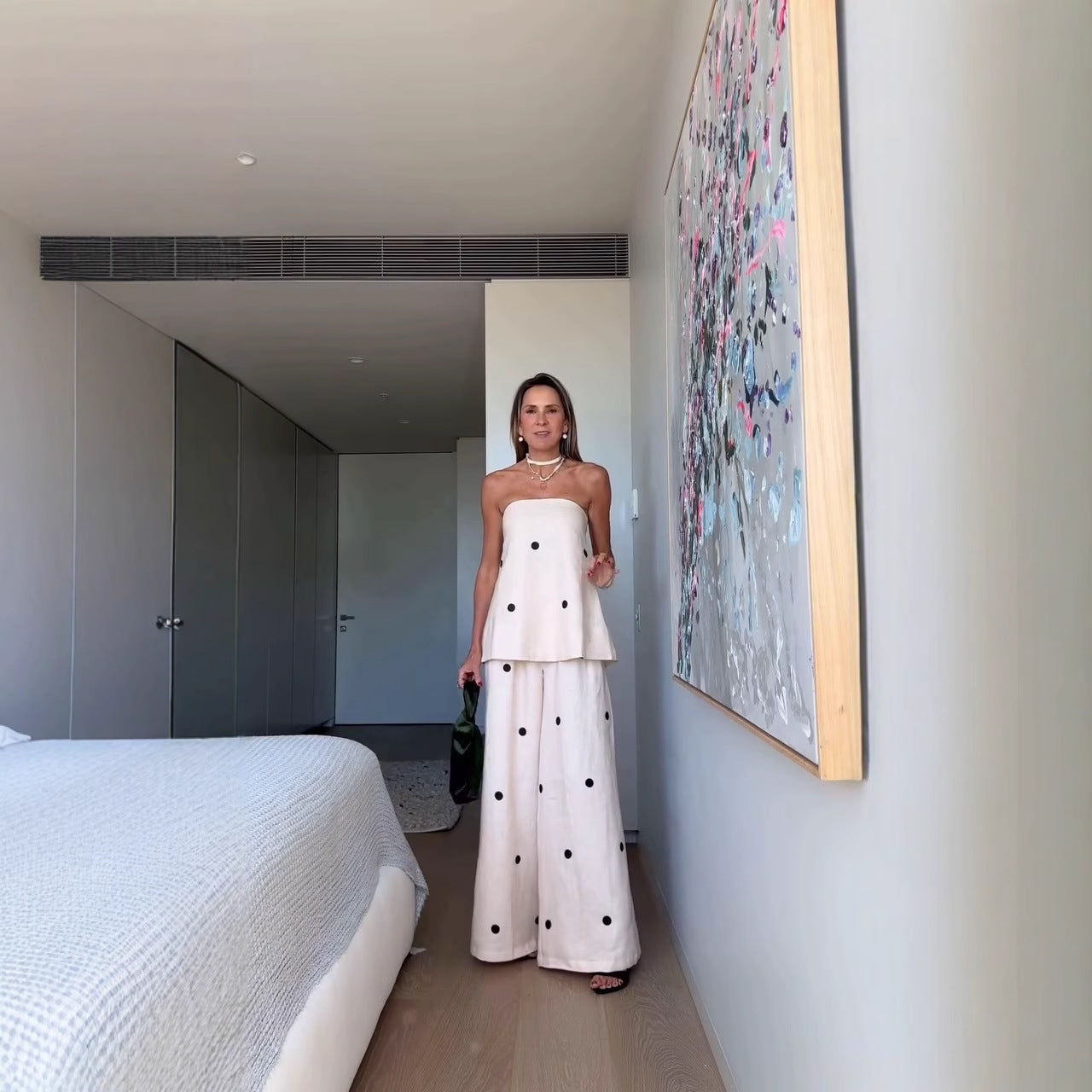 Women's set consisting of a sleeveless top and wide polka dot pants Chic und Stil