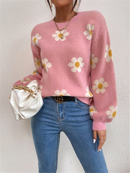 Pull en tricot pour femmes avec un motif floral ludique et des manches bouffantes élégantes Chic und Stil