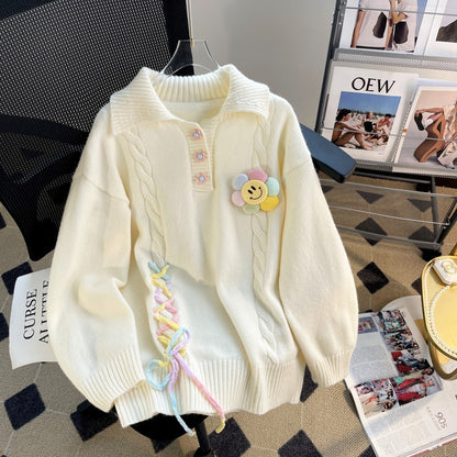 Pull en grosse maille pour femmes avec des applications colorées et un col à structure côtelée Chic und Stil