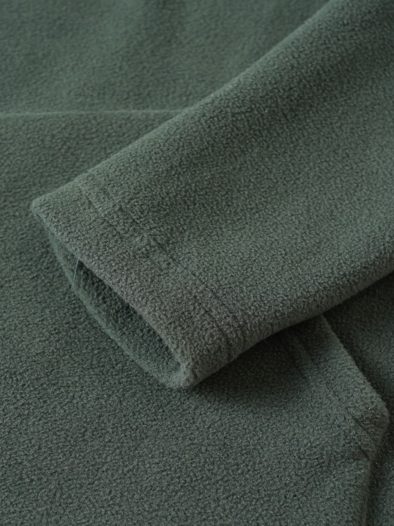 Men's fleece pullover with trendy high collar and practical button details Chic and Style