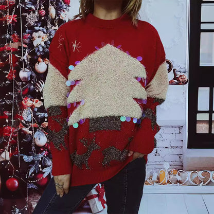 Pull féminin festif avec motif de Noël et appliqués scintillants Chic und Stil