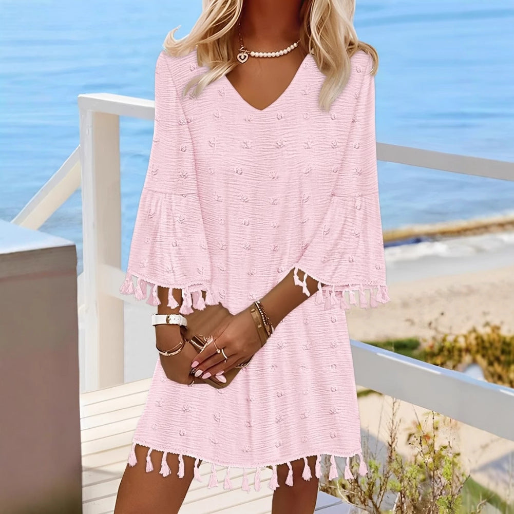 Robe de plage pour femmes avec un élégant décolleté en V et des franges décoratives Chic und Stil